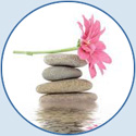 Hot stone massage is a Specialty massage where the therapist uses smooth, flat, heated stones as an extension of his/her own hands. This is done either by placing the heated stones on the body on specific areas or by relaxing and soothing the tense muscles so the therapist can work deeper into muscle fibers. 